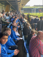 Team in South stand.png